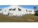 White single wide mobile home, side view at 3334 Overcup Oak Ter, Sarasota, FL 34237