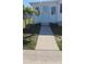 Mobile home entrance with walkway and landscaping at 3334 Overcup Oak Ter, Sarasota, FL 34237