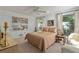 Comfortable bedroom featuring a queen-sized bed, neutral tones, and a serene atmosphere at 3350 Old Oak Dr, Sarasota, FL 34239