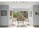 Bright breakfast nook features charming decor and natural light from the large window at 3350 Old Oak Dr, Sarasota, FL 34239