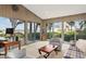 Comfortable living room with vaulted ceilings, neutral tones, and large windows offering stunning water views at 3350 Old Oak Dr, Sarasota, FL 34239