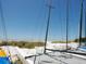 Catamarans on the beach near calm ocean water at 3450 77Th W St # 102, Bradenton, FL 34209