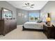 Spacious bedroom with a king-size bed, dresser, and nightstands at 3450 77Th W St # 102, Bradenton, FL 34209