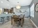 Rustic dining table with six chairs in the dining area at 3450 77Th W St # 102, Bradenton, FL 34209