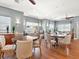 Community dining room with hardwood floors and elegant seating at 3450 77Th W St # 102, Bradenton, FL 34209