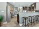 Kitchen with breakfast bar and rustic style stools at 3450 77Th W St # 102, Bradenton, FL 34209