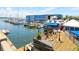 Boats docked at a marina with waterfront shops at 3450 77Th W St # 102, Bradenton, FL 34209
