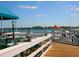 Outdoor dining area on a pier overlooking the water at 3450 77Th W St # 102, Bradenton, FL 34209