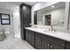 Elegant bathroom with double vanity and marble floors at 3479 Knox Ter, Port Charlotte, FL 33948