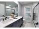Modern bathroom with double vanity and marble at 3479 Knox Ter, Port Charlotte, FL 33948