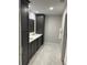 Elegant bathroom with double vanity, marble floors, and a large shower at 3479 Knox Ter, Port Charlotte, FL 33948