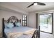 Bedroom with pool view and a ceiling fan at 3479 Knox Ter, Port Charlotte, FL 33948