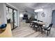 Dining room with modern table and access to backyard at 3479 Knox Ter, Port Charlotte, FL 33948