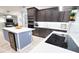 Modern kitchen with stainless steel appliances and an island at 3479 Knox Ter, Port Charlotte, FL 33948