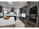 Open kitchen boasts stainless steel appliances and an expansive island at 3479 Knox Ter, Port Charlotte, FL 33948