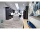 Modern kitchen with dark cabinetry and a large island at 3479 Knox Ter, Port Charlotte, FL 33948