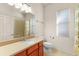 Clean bathroom with wood vanity and shower/tub combo at 3614 Summerwind Cir, Bradenton, FL 34209