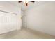 Bedroom with double door closet and ceiling fan at 3614 Summerwind Cir, Bradenton, FL 34209