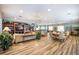 Relaxing community room with comfortable seating and a fireplace at 3614 Summerwind Cir, Bradenton, FL 34209