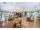 Community room with tables, seating, and a kitchenette at 3614 Summerwind Cir, Bradenton, FL 34209