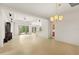 Open living space with tile floors and a view of the backyard at 3614 Summerwind Cir, Bradenton, FL 34209