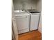 Laundry room with Samsung washer and dryer at 4009 Crockers Lake Blvd # 26, Sarasota, FL 34238