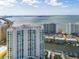 Aerial view of modern condo building and waterfront at 401 Quay Commons # 901, Sarasota, FL 34236
