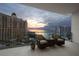 Spacious balcony with sunset views and comfortable seating at 401 Quay Commons # 901, Sarasota, FL 34236