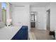 Modern bedroom with ensuite bathroom and city views at 401 Quay Commons # 901, Sarasota, FL 34236