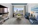 Relaxing living room with water views at 401 Quay Commons # 901, Sarasota, FL 34236
