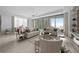 Bright living room with hardwood floors and a fireplace at 401 Quay Commons # 901, Sarasota, FL 34236