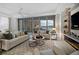 Spacious living area showcasing stunning water views at 401 Quay Commons # 901, Sarasota, FL 34236