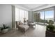 Peaceful sitting area with water views and comfy seating at 401 Quay Commons # 901, Sarasota, FL 34236