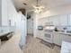 Modern kitchen with white cabinets and granite countertops at 4913 22Nd E Ct, Bradenton, FL 34203