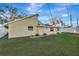 House exterior and side yard with grassy area at 5101 Island Date St, Sarasota, FL 34232