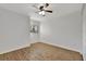 Well-lit bedroom with ceiling fan and wood-look floors at 5101 Island Date St, Sarasota, FL 34232