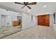 Open concept dining room with kitchen views and tile floors at 5101 Island Date St, Sarasota, FL 34232