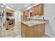 Kitchen boasts granite countertops and stainless steel appliances at 5101 Island Date St, Sarasota, FL 34232