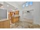 Open kitchen features granite counters and wood cabinets at 5101 Island Date St, Sarasota, FL 34232