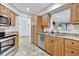 Modern kitchen with stainless steel appliances and granite countertops at 5101 Island Date St, Sarasota, FL 34232