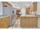 Modern kitchen featuring stainless steel appliances and granite countertops at 5101 Island Date St, Sarasota, FL 34232