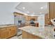 Well-equipped kitchen with granite countertops and stainless steel appliances at 5101 Island Date St, Sarasota, FL 34232