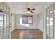 Light and airy living room with hardwood floors and french doors at 5101 Island Date St, Sarasota, FL 34232