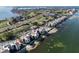 Aerial view of a condo complex on the water next to a golf course at 5633 Puerta Del Sol S Blvd # 307, St Petersburg, FL 33715