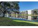 Condo building exterior on a lake at 6190 80Th N St # 111, St Petersburg, FL 33709