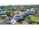 Aerial view of house with storm damage and surrounding area at 6516 Bayou Hammock Rd, Longboat Key, FL 34228