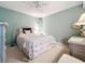 Guest bedroom with a coastal theme and wicker furniture at 6609 Stone River Rd # 104, Bradenton, FL 34203