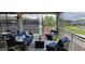 Relaxing patio furniture with view of tennis courts at 6609 Stone River Rd # 104, Bradenton, FL 34203
