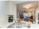 Kitchen features a double sink, coffee maker, and view of living room at 718 N Jefferson Ave # 718, Sarasota, FL 34237