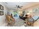 Living area featuring a leather couch and rocking chairs at 718 N Jefferson Ave # 718, Sarasota, FL 34237